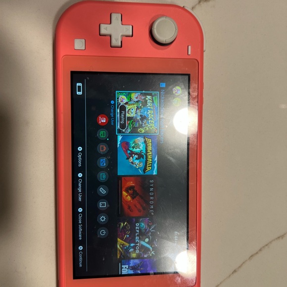 Nintendo Switch Lite in Coral - Picture 1 of 3